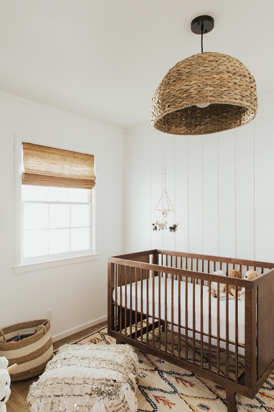 a neutral and minimal baby boy nursery