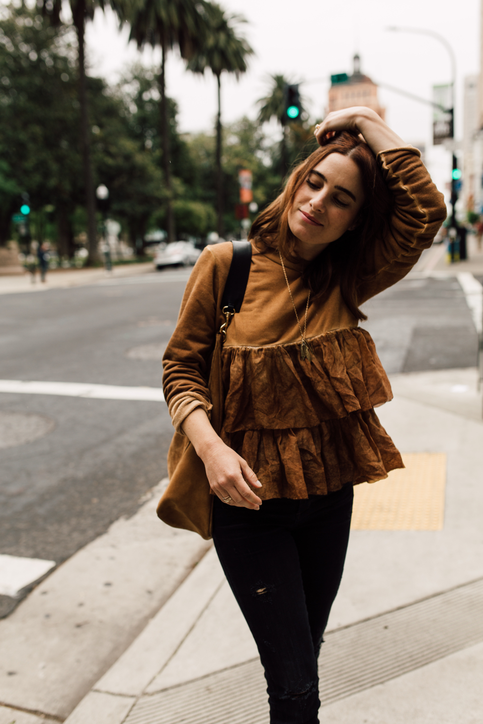 a stylish ruffled sweatshirt