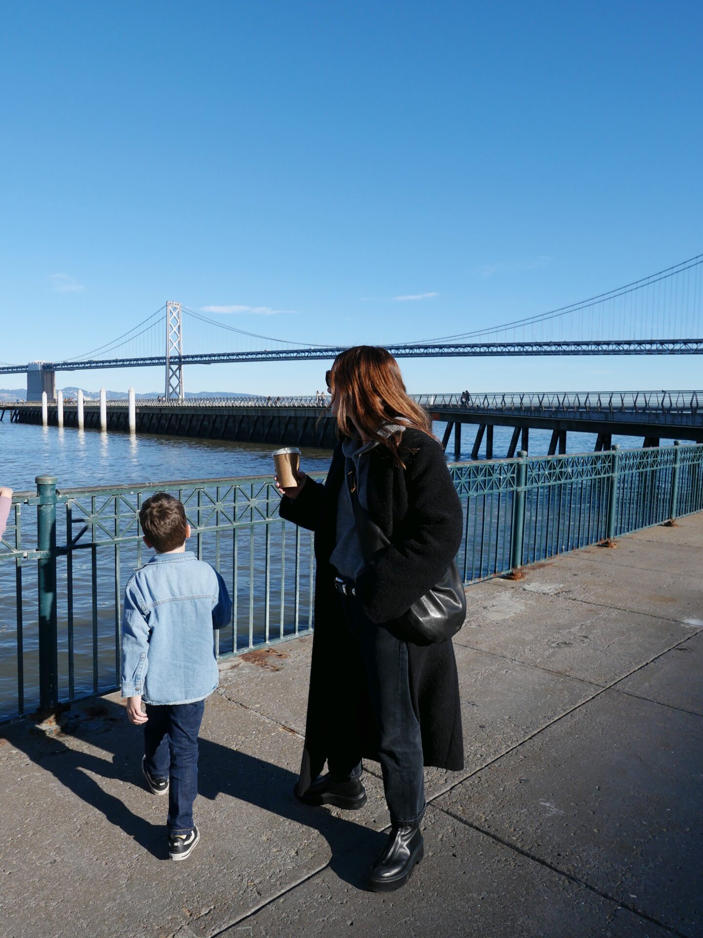 woman with her kid spending time outdoors during their weekend stay at the 1 Hotel San Francisco