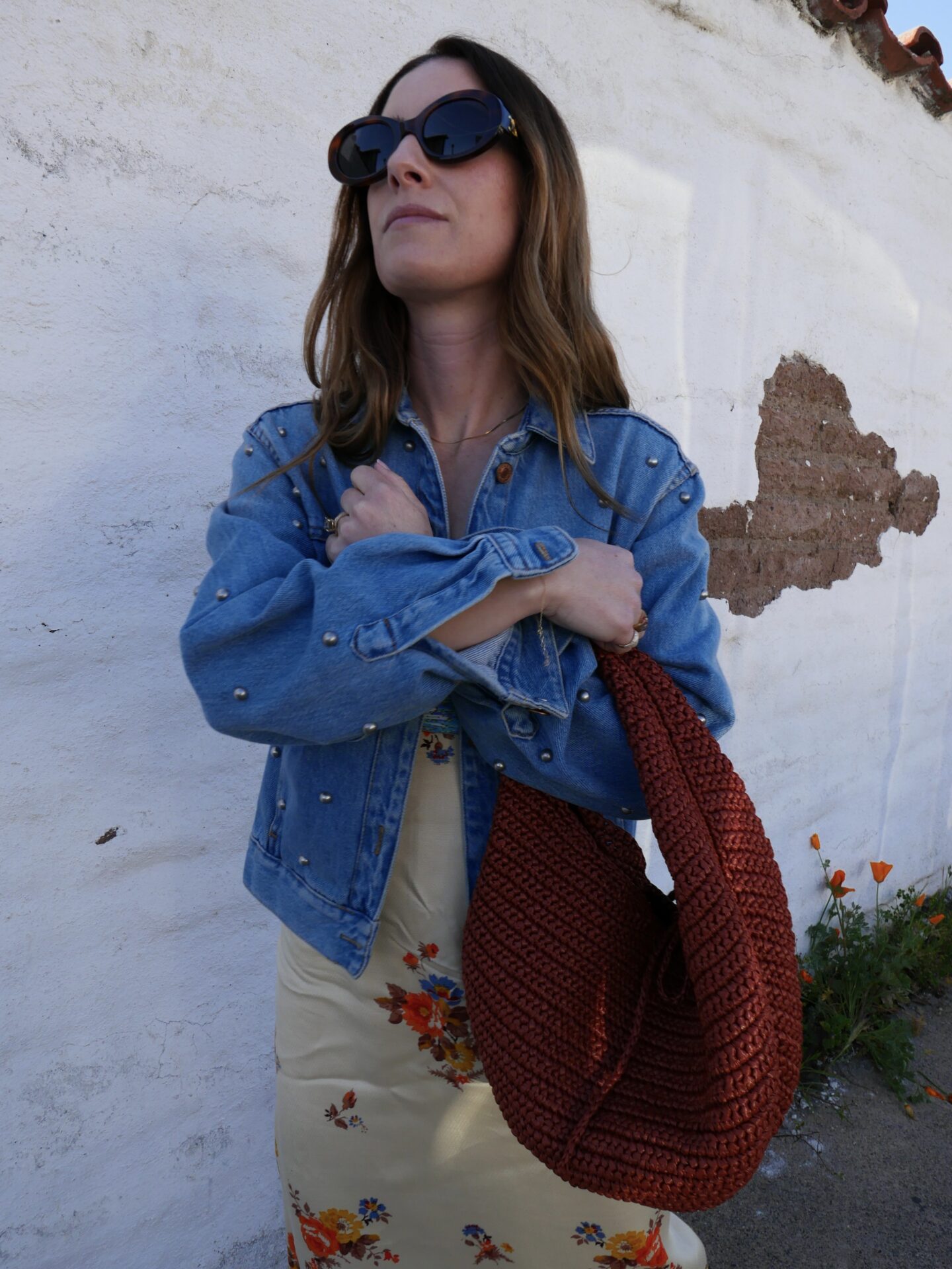 woman holding a red bag