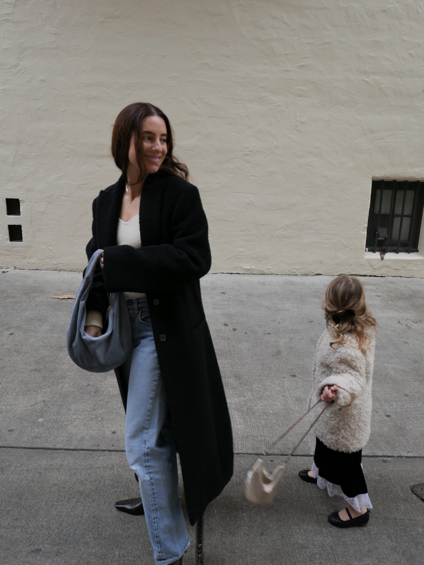 Alicia Lund wearing one of her 6 Great Black Coats |