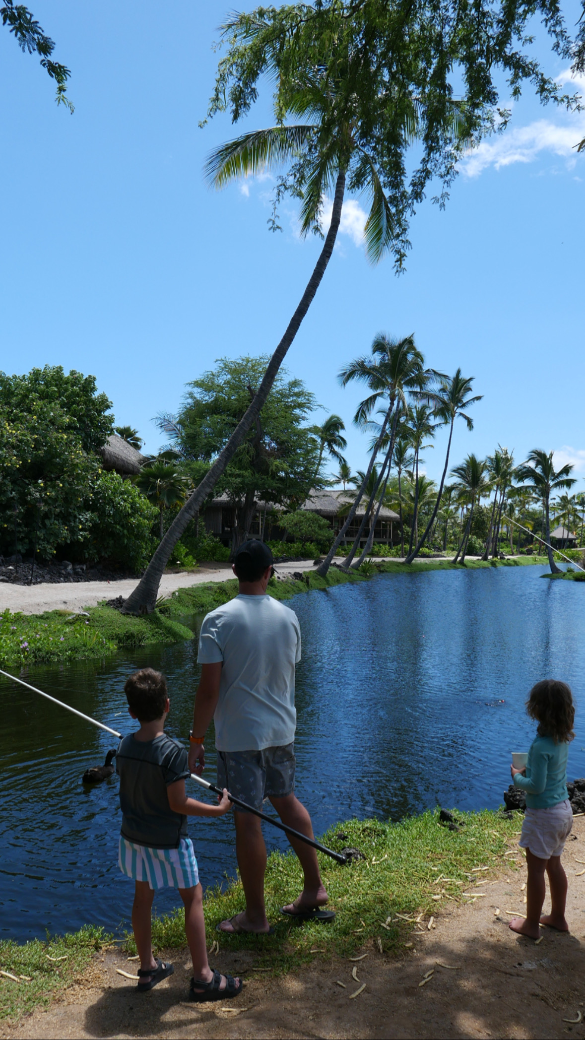 kids with their dad went fishing